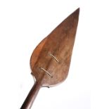 TRIBAL: A SOUTH SEA ISLANDS PADDLE, the pointed blade with incised tracery