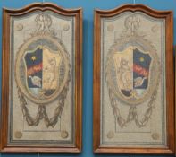 A PAIR OF WALNUT FRAMED HATCHMENTS