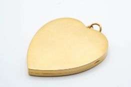 A YELLOW GOLD HEART LOCKET