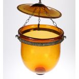 A VICTORIAN AMBER GLASS HANGING LIGHT DOME WITH ORIGINAL GLASS TOP