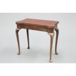 A GEORGE III MAHOGANY FOLDOVER TEA TABLE