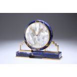 A CARTIER LAPIS LAZULI AND MOTHER-OF-PEARL SUNBURST DESK CLOCK