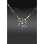 AN 18CT WHITE GOLD AND DIAMOND PENDANT