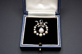 A DIAMOND AND NATURAL PEARL BROOCH