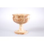 A TURNED ONYX CHALICE, with belted bowl and knopped stem. 12.5cm