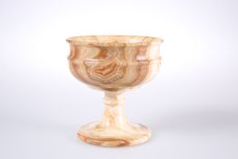 A TURNED ONYX CHALICE, with belted bowl and knopped stem. 12.5cm