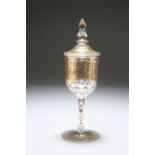 A SMALL BOHEMIAN GILT-DECORATED GOBLET AND COVER, 19th CENTURY