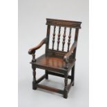 A VICTORIAN CARVED OAK CHAIR, IN 17TH CENTURY STYLE