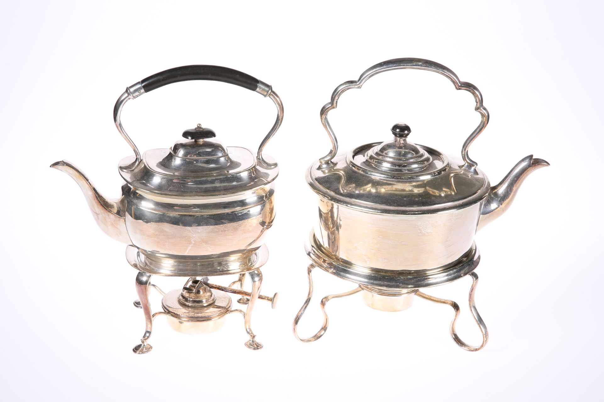 TWO EDWARDIAN SILVER-PLATED SPIRIT KETTLES, the first by Atkin Bros