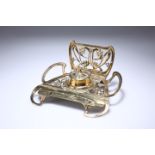 AN ART NOUVEAU BRASS INKSTAND