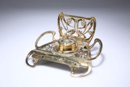 AN ART NOUVEAU BRASS INKSTAND