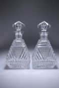 A PAIR OF CUT-GLASS DECANTERS, IN THE ART DECO TASTE