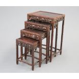A NEST OF FOUR CHINESE HARDWOOD TABLES, CIRCA 1900