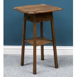 AN ARTS AND CRAFTS OAK OCCASIONAL TABLE