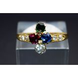 AN 18CT YELLOW GOLD AND GEM SET RING