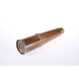 A LARGE WWII TWO-DRAW BRASS AND LEATHER NAVAL TELESCOPE, DATED