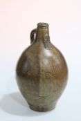 A 17TH CENTURY RHENISH SALT-GLAZED STONEWARE BELLARMINE