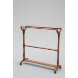 A 19TH CENTURY MAHOGANY COUNTRY HOUSE TOWEL RAIL