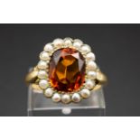A CITRINE AND SEED PEARL RING