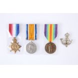 A WORLD WAR I MEDAL TRIO AND CAP BADGE, Pte. T. Quinn, D.L.I.