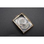 A YELLOW METAL MOUNTED GLASS INTAGLIO PENDANT