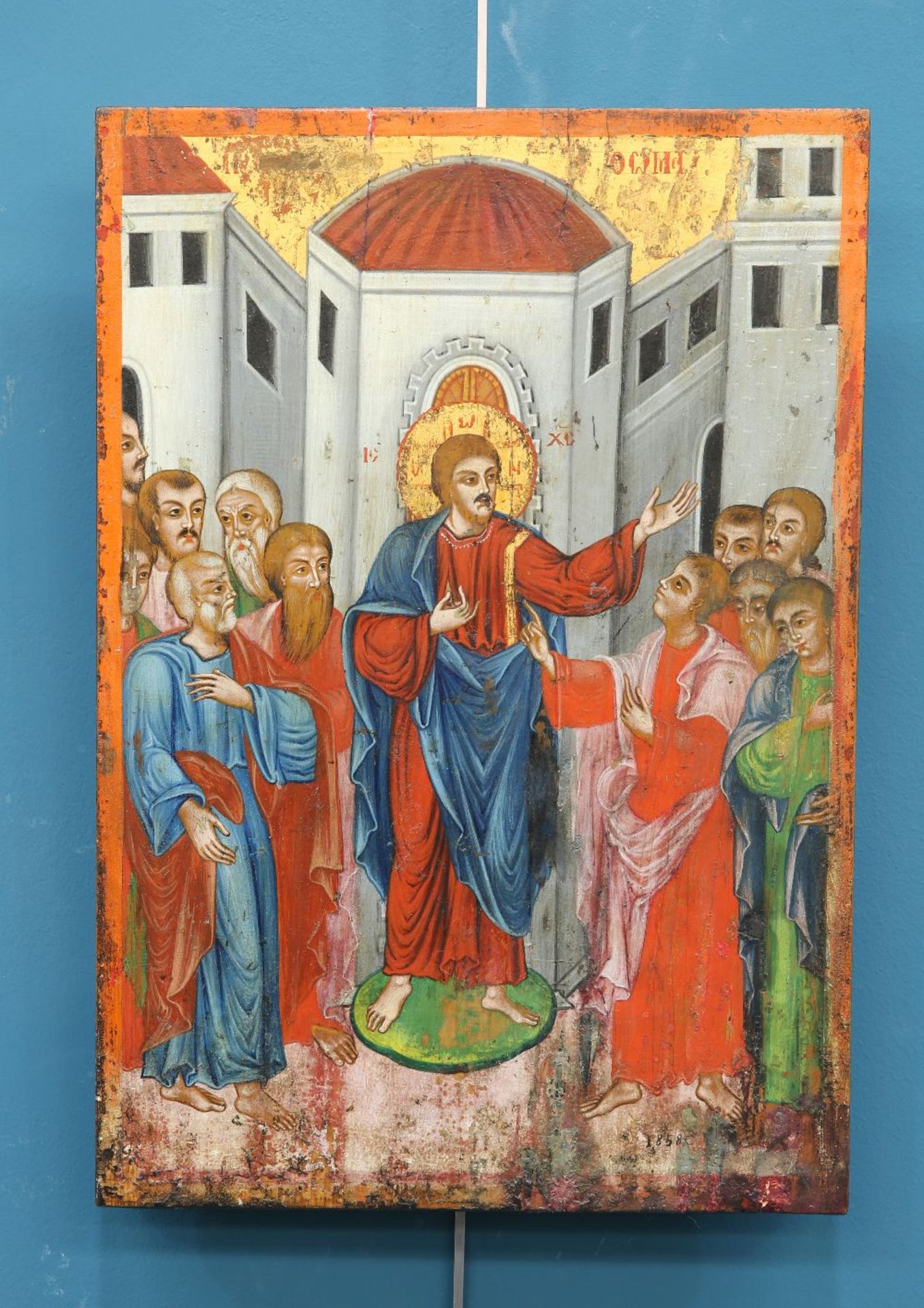 A RUSSIAN ICON, painted with saintly figure and petitioners, bears the date 1858 - Image 2 of 3