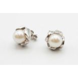 A PAIR OF CULTURED PEARL STUD EARRINGS