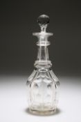 A CUT-GLASS BARREL-SHAPED DECANTER