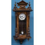 A LATE 19TH CENTURY MUSICAL VIENNA PATTERN WALL CLOCK