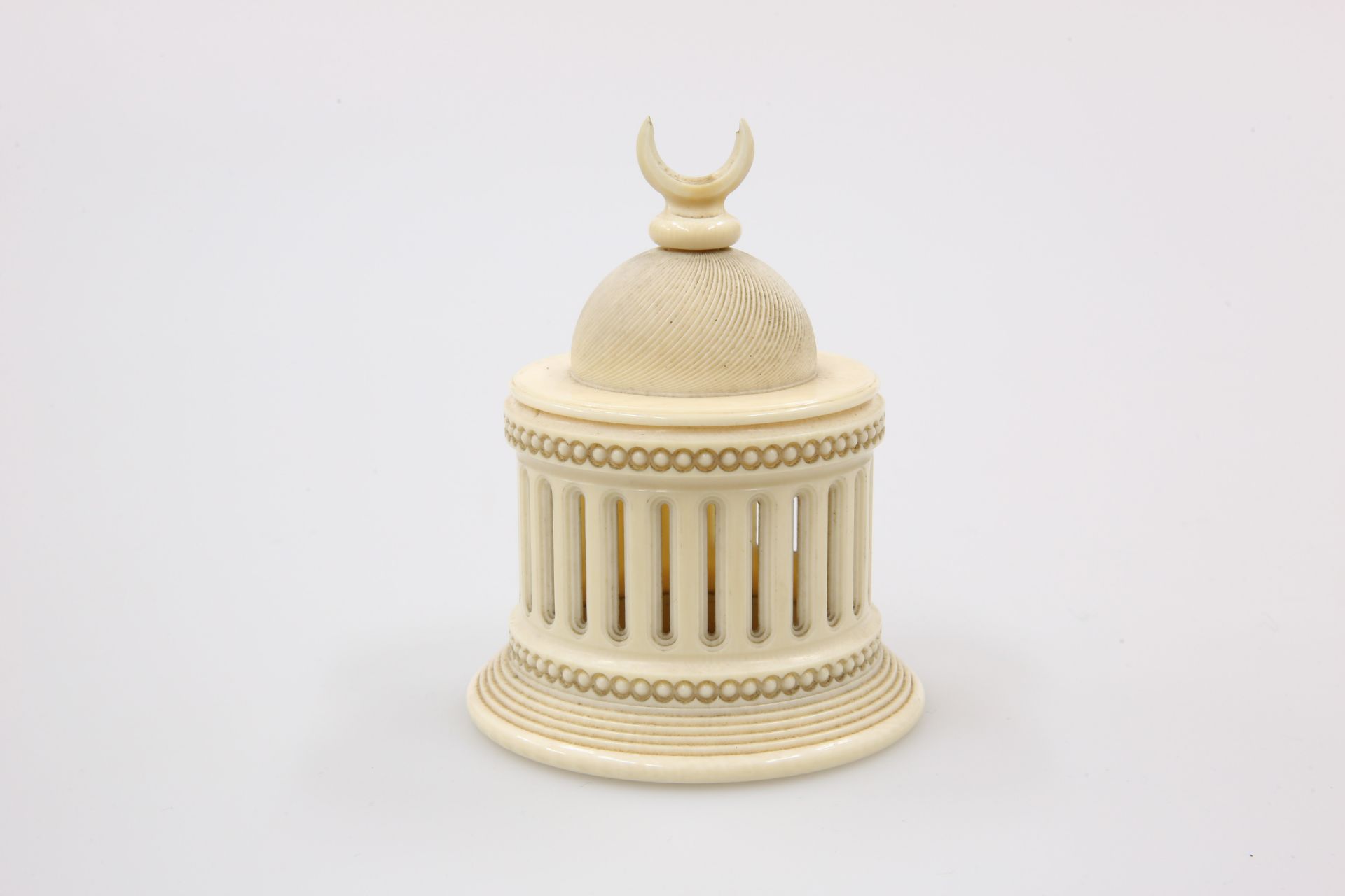 AN INDIAN IVORY TEMPLE FORM BOX, C.1900