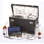 A 1950'S MEDICAL CASE, including an array of instruments and bottles.