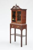 A MAHOGANY CABINET ON STAND, 18TH CENTURY AND LATER