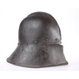 A SALLET, with raised metal ridge. 38cm front to back