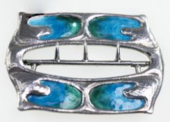 AN ARTS AND CRAFTS SILVER AND ENAMEL BELT BUCKLE