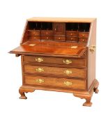 A GEORGIAN STYLE MAHOGANY MINIATURE BUREAU