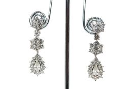 A PAIR OF DIAMOND PENDENT EARRINGS