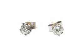 A PAIR OF DIAMOND STUD EARRINGS