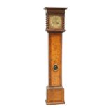 A WALNUT EIGHT-DAY LONGCASE CLOCK