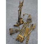 A COLLECTION OF 19TH CENTURY AND LATER BRASS FIRE TOOLS