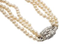 A MULTI-STRAND CULTURED PEARL NECKLACE WITH A DIAMOND CLASP