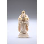 19TH CENTURY IVORY FIGURAL CHESS PIECE, carved as the figure of a Bishop