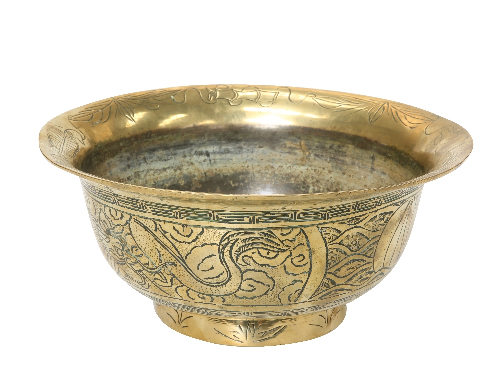 A LARGE CHINESE BRASS BOWL