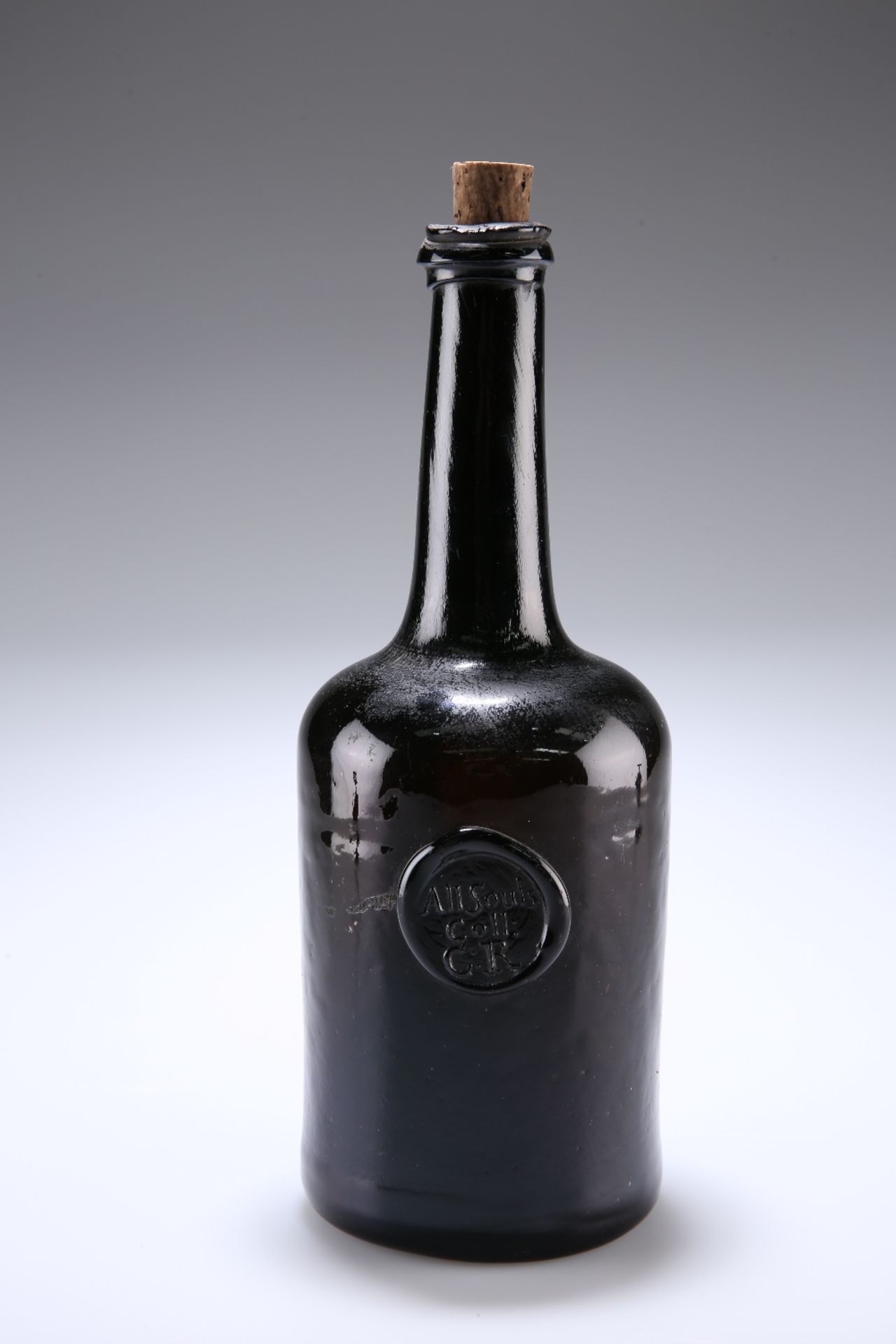 AN OXFORD COLLEGE OLIVE GLASS COMMON ROOM WINE BOTTLE