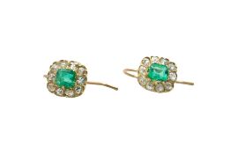 A PAIR OF EMERALD AND DIAMOND CLUSTER EARRINGS