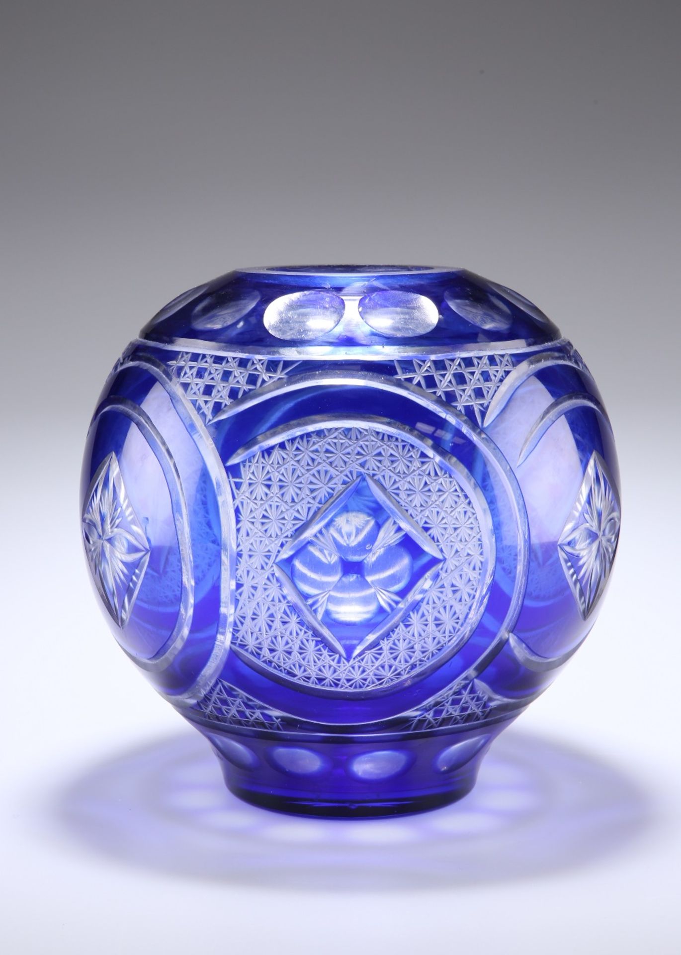 A LARGE BOHEMIAN BLUE OVERLAY GLASS VASE - Image 2 of 2
