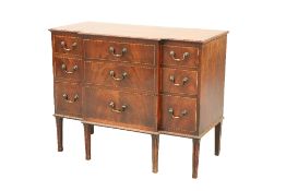 A SMALL GEORGE III MAHOGANY BREAKFRONT COMMODE