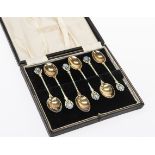 A BOXED SET OF SIX GEORGE V SILVER AND ENAMEL SPOONS