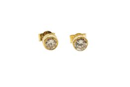 A PAIR OF DIAMOND STUD EARRINGS