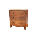 AN EARLY 19TH CENTURY MAHOGANY MINIATURE CHEST OF DRAWERS