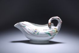 A RARE WORCESTER PORCELAIN POLYCHROME LEAF SAUCE BOAT WITH CONJOINED LIP, c. 1760